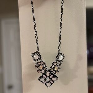 Elegant Floral Necklace with Black and White Accents